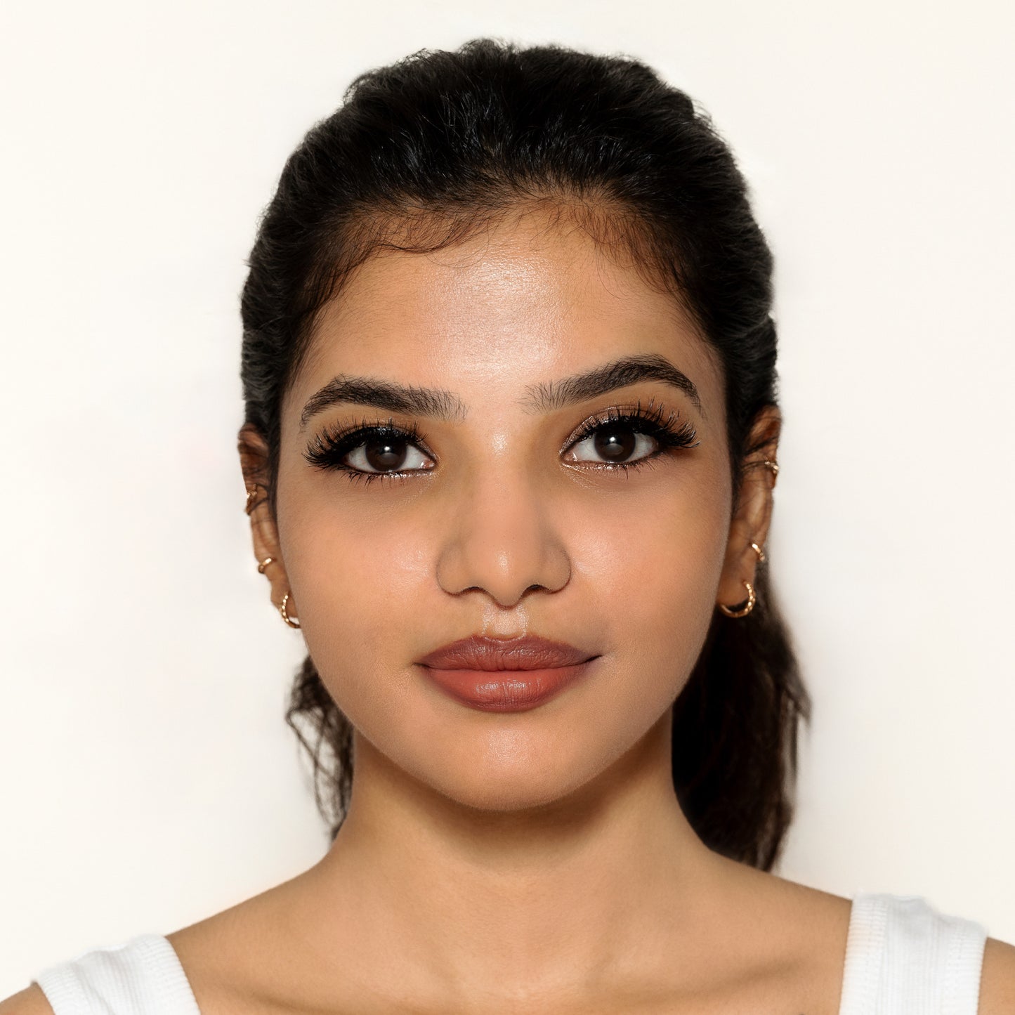 Aisha, the bold dramatic lash with full volume and an invisible band, delivering 15–20 wears of luxurious lash impact for statement-making eyes.
