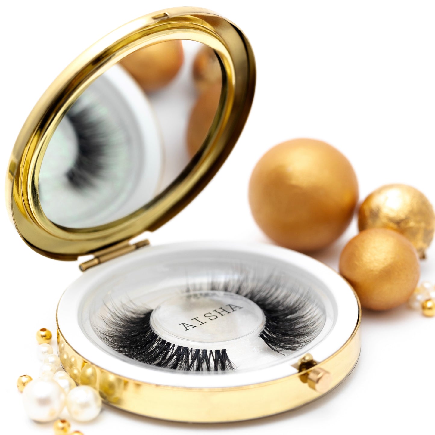 Aisha, the bold dramatic lash with full volume and an invisible band, delivering 15–20 wears of luxurious lash impact for statement-making eyes.