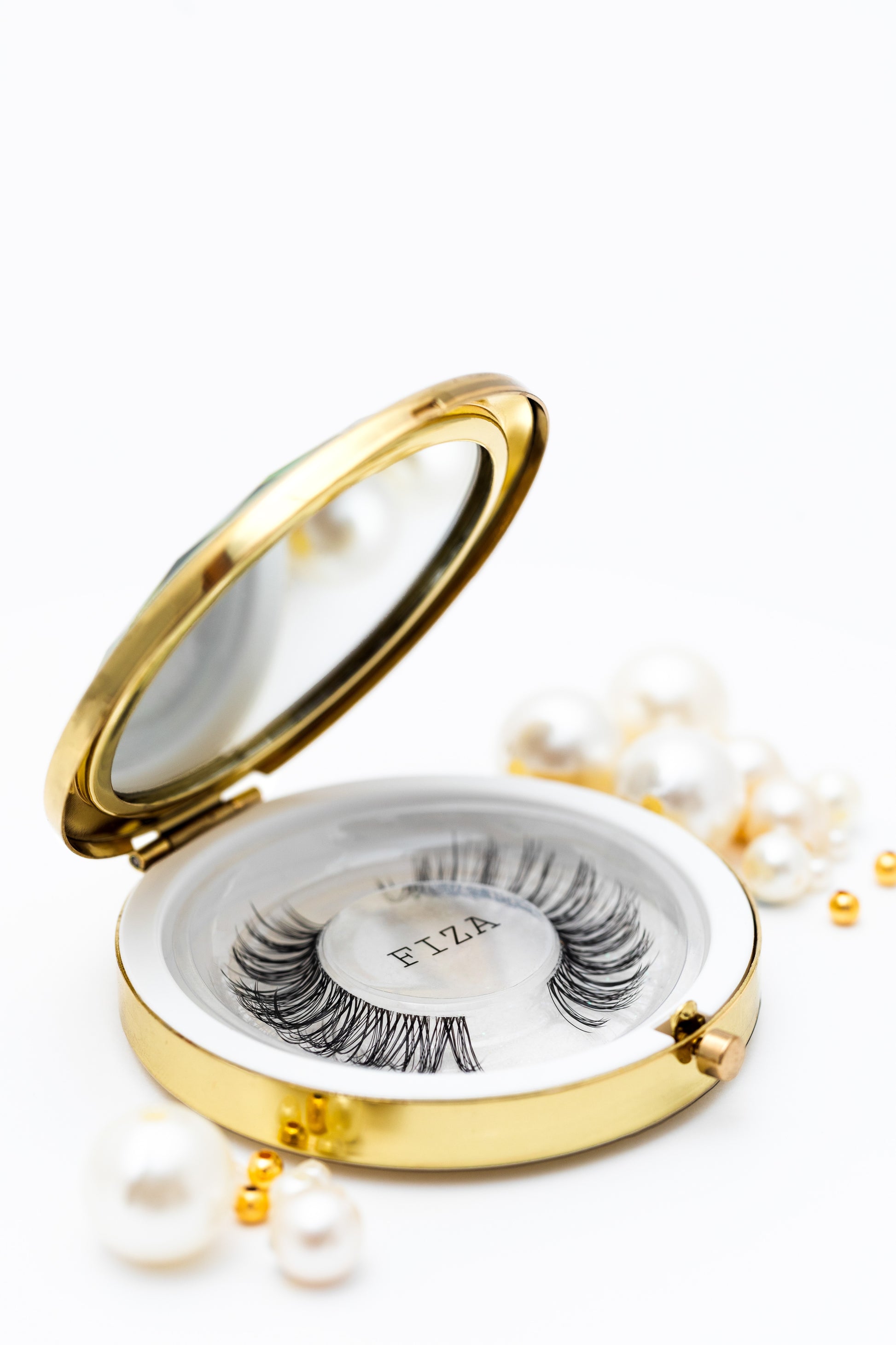Fiza fluttery lashes showcasing bold yet natural volume for subtle glamour and eye enhancement.